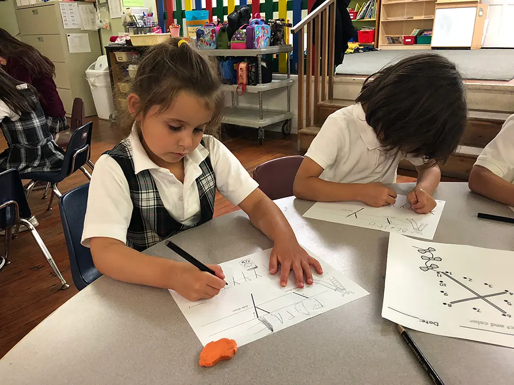 Schoolgirl doing assignment